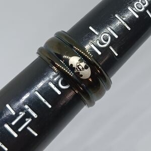 Elegant Black Ring with Silver Accent